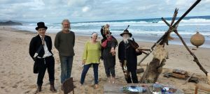 Preparing for a Heart Maps walk scene on the beach
